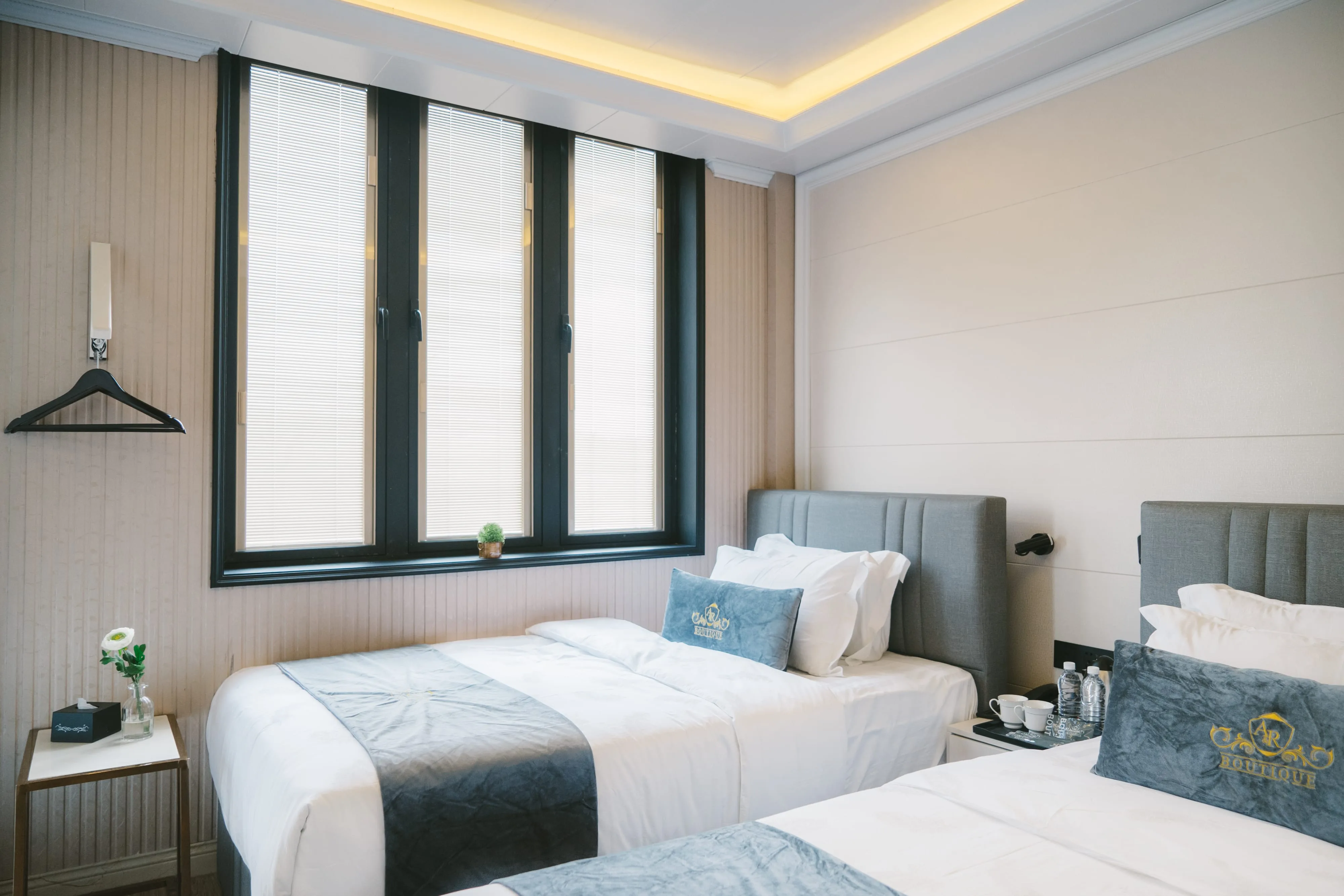 Executive Twin room with two beds, windows and A&R Boutique logo cushions, Cheras