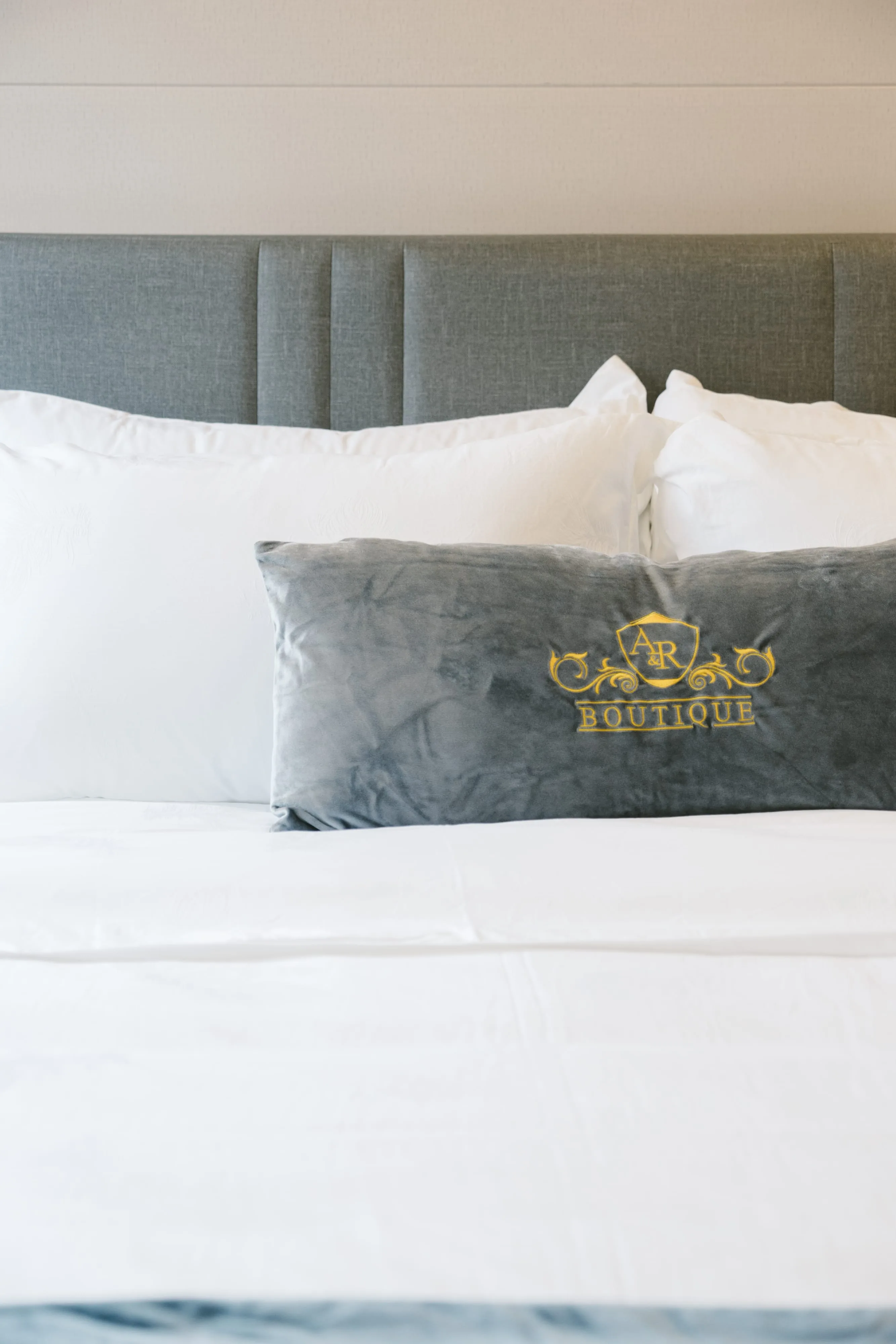 Standard Queen bed with A&R Boutique logo cushion, Cheras